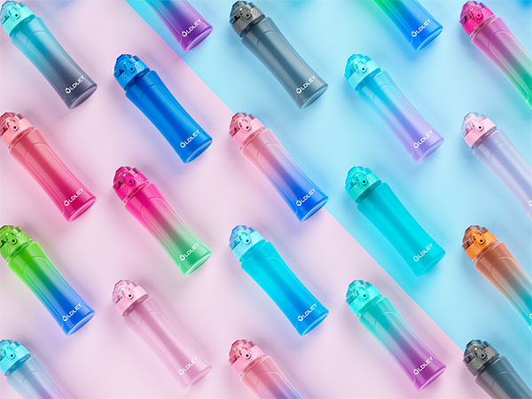many colorful gradient water bottles in blue teal pink green purple and gray arranged diagonally on pink and blue background