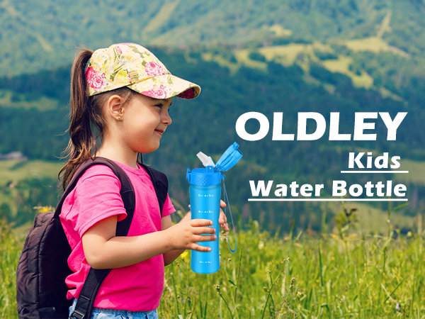young girl in pink shirt and floral cap with black backpack holding blue water bottle in green meadow